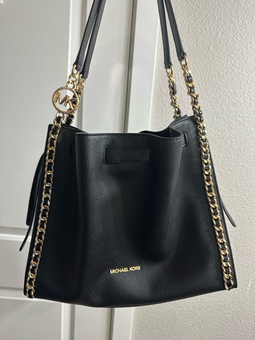 The Mina MK Black Leather Bag with Gold Chain Trim and matching wallet